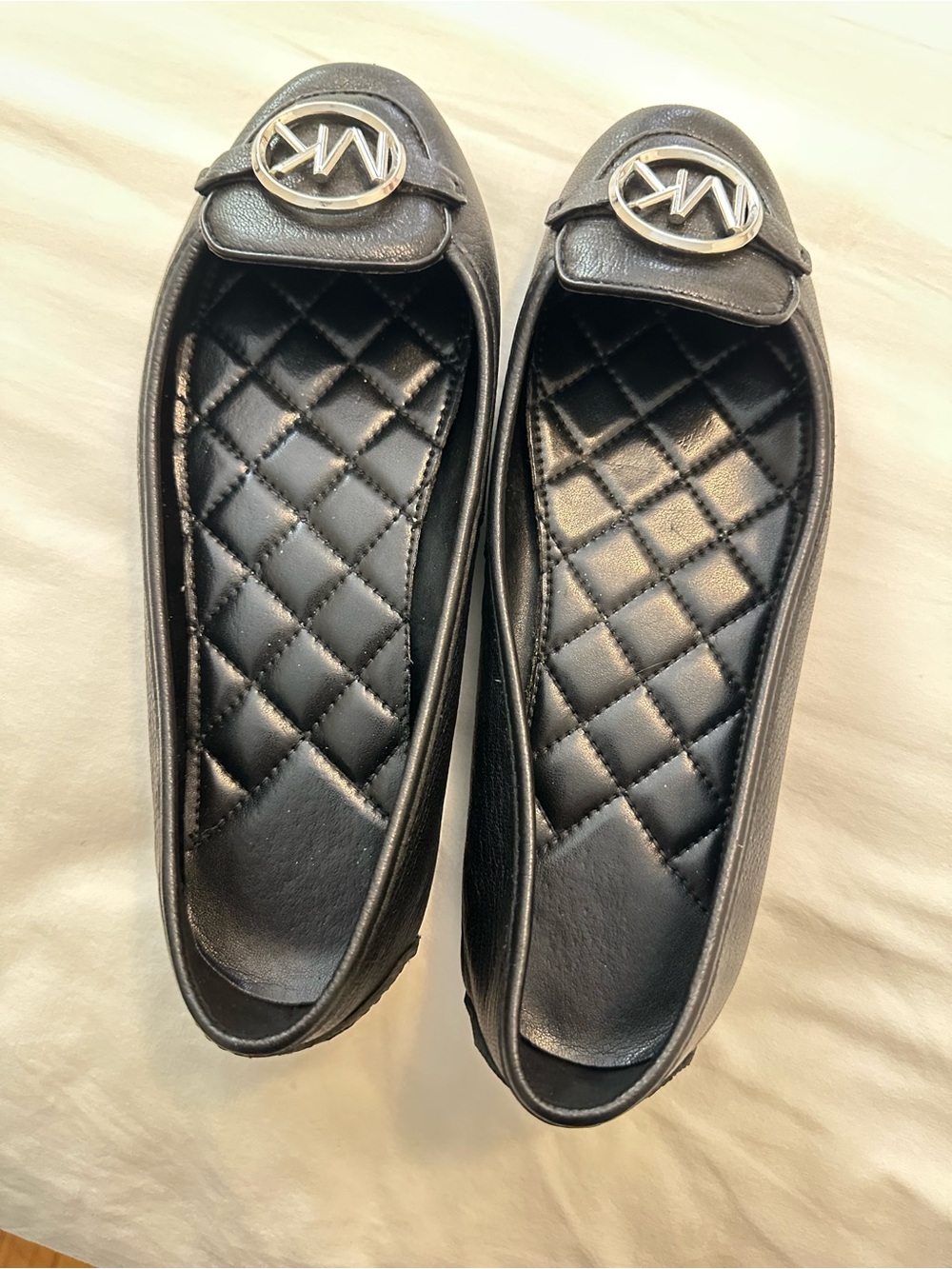 Michael Kors Black Quilted Logo Ballet Flats with Gold Emblem